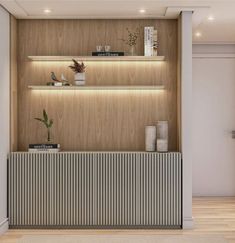 an empty room with shelves and plants on the wall