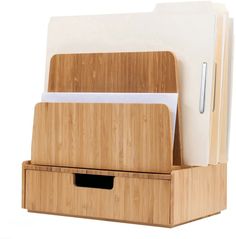 a wooden desk organizer with two file folders