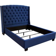 a blue upholstered bed frame with buttons