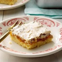 a piece of cake sitting on top of a white plate with a fork in it