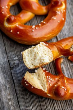 two pretzels with sesame seeds on them