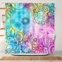 a colorful shower curtain with an abstract design