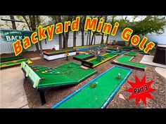 the backyard mini golf course is set up