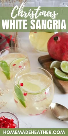 christmas white sangria with pomegranates and lime on the rim, served in glasses