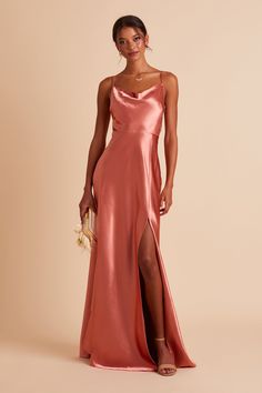 OUR LISA MIDI GOT A GLOW-UP!
If our Lisa Satin Midi is the young, fun-loving sister, this floor-length one is the elegant, grown-up sis. She still flaunts the same signature 90s cowl neck, but this Lisa is a head-turning statuesque beauty. We see this satin bridesmaid dress paired with a chic little clutch, and a dainty pearl necklace to accentuate your collarbone.
THE 411

Lightly draped cowl neck 
Invisible center back zipper 
Fully lined floor-length skirt with slit 
No bra cups Unlike our ot Terracotta Bridesmaid, Rust Bridesmaid Dress, Orange Bridesmaid, Satin Gowns, Orange Bridesmaid Dresses, Satin Bridesmaid Dress, Birdy Grey, Satin Dress Long, Bridesmaid Dress Colors