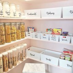 the pantry is stocked with many different types of food and snacks, including pasta noodles