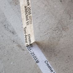 a piece of paper that is laying on the ground