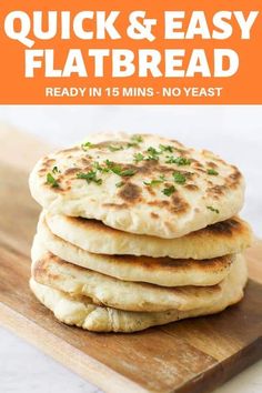 stack of flatbreads on a cutting board with text overlay reading quick and easy flat bread ready in 15 mins - no yeast