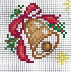 a cross stitch christmas ornament with a dog