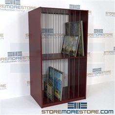 a book shelf with several books and magazines on it in front of a white background