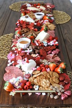 a wooden table topped with lots of food