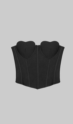 Introducing a luxurious addition to your wardrobe - the Strapless Corset Cropped Top in black. Crafted from the finest fabric. this elegant top features a corset-style bodice for a contoured. figure-hugging fit. Sophisticated and timeless. this piece exudes charisma and can easily be dressed up or down. making it the perfect must-have item for your wardrobe.Gentle Dry Clean OnlyColour may vary due to lighting on images. The product images (without model) are closest to the true colour of the pro