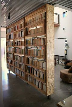 an open book shelf with many books on it and the words made - to - order sliding doors