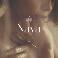 a woman with her hands on her chest and the words naya above her face