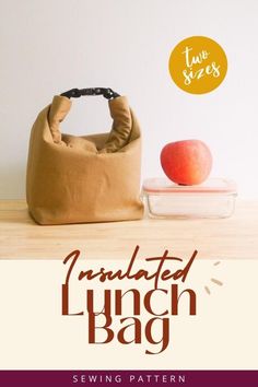 a bag sitting on top of a table next to an apple