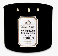 white barn mahogany teakwood high intensity scented candle in a black container with labels