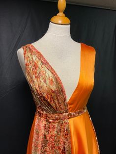 PRODUCT DETAILS Dress in duchess satin and orange printed royal muslin. White satin silk lining. - handmade. - unique piece. - size 36/38 French. - Back and front not identical. - In front one side draped and the other simple. Wrap dress that closes on the side of the back. DELIVERY Each package is well packed and sent by French post in case of free delivery. The shipping period from destination country usually takes 2-4 weeks. All items are sent by registered airmail. Please let us know if you Simple Wrap Dress, Duchess Satin, Orange Dress, White Satin, Dress Clothes For Women, Dress Details, Silk Satin, Unique Pieces, Wrap Dress