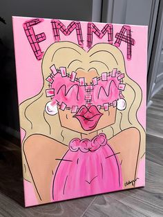 a painting of a woman's face with the word fema written on it