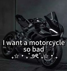 a black motorcycle with the words i want a motorcycle so bad