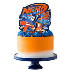 an orange and blue cake with the name nerf on it