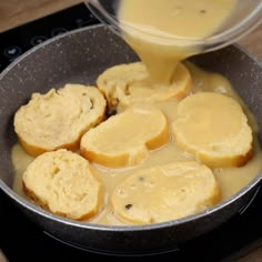 bread and gravy being poured into a skillet