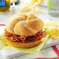 a sandwich sitting on top of a cutting board