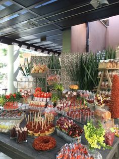 an assortment of desserts and candies on display