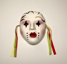 "Welcome to Zazzy Florals! Up for sale is a vintage ceramic wall mask, art deco style theatrical mask female clown face. Made in Taiwan. Circa 1980's. Hand painted. Has original sticker inside. Good used condition. Does have a chip on back edge inside of mask (does not show from front). See pictures. Dimensions: Approx. 6\" wide x 7 1/2\" tall x 3\" thick. Ready to ship! Happy shopping!" Theatrical Mask, Mask Wall Decor, Clown Face, Female Clown, Ceramic Mask, Clown Mask, Mask Art, Clown Faces, Wall Mask