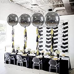 black and white party decorations with disco balls