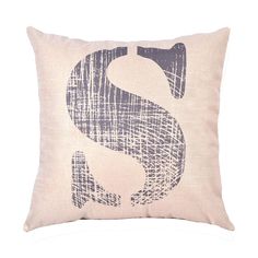 a decorative pillow with the letter s on it