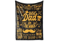 a black and yellow wall hanging with the words best dad in the world