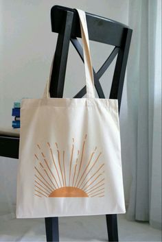 a tote bag sitting on top of a chair