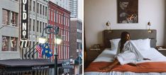 a woman laying on top of a bed next to a tall building