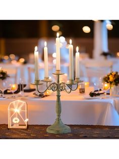 a candelabra with lit candles on it