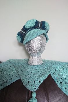 "Show off your retro style with this crocheted patchwork cap in fun teal and turquoise color combo! This brimmed tam is hand crocheted with a stretchy stitch and is roomy for short or long hair. The hat accomodates 21\" up to 24\" around. Hand washable. KraftyChickStudio is offering free domestic shipping on this item anywhere in the USA" Blue Crochet Cap, Blue Crochet Hat One Size Fits Most, Blue Bohemian Crochet Hat With Brim, Blue Brimmed Bohemian Crochet Hat, Blue Handmade Crochet Hat One Size, Blue Hand-knitted Crochet Hat One Size, Hand Knitted Blue Crochet Hat One Size, Blue Bohemian Crochet Hat, Blue Bohemian Crochet Cap