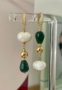 Welcome to my original designs which are all handmade. I prefer to use gemstones and natural stones. Thank you for visiting my shop! This Women's Asymmetric earrings made from natural Freshwater Baroque Pearls and Green Jade stone.18 k Gold plated English lock clasp .Earrings length 2,5 inches.Brand New.Handmade. Gold Drop Pearl Earrings With Gemstones, Elegant Drop Earrings With Natural Stones, Elegant Linear Drop Earrings With Natural Stones, Elegant Gold Linear Earrings With Natural Stones, Gold Natural Stones Drop Pearl Earrings, Gold Dangle Pearl Earrings With Natural Stones, Elegant Handmade Green Linear Earrings, Elegant Beaded Jade Earrings, Handmade Baroque Pearl Drop Earrings