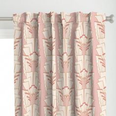 a pink and white curtain with an abstract design