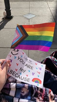 someone holding up a sign that says you are my because