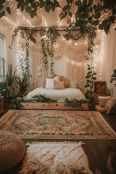 a bedroom decorated with greenery and string lights