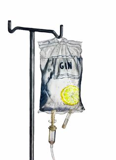 a bag with a lemon on it hanging from a hook in front of a water faucet