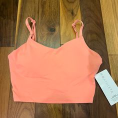 Brand New With Tag Athletica Elevation V-Neck Crop Sports Top Any Size Cup With Adjustable Straps Spring Sports Crop Top With Built-in Bra, Summer Racerback Crop Top For Pilates, Spring Activewear Crop Top With Built-in Bra, Bra-friendly Crop Top Activewear For Spring, Pink Spring Activewear With Built-in Bra, Pink Sports Crop Top With Built-in Bra, Spring Seamless Tank Top For Pilates, Sleeveless Pink Top For Pilates, Seamless Tank Top For Spring Pilates