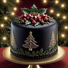 a christmas cake decorated with holly and ornaments