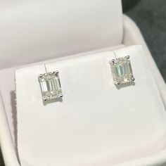 Moissanite offers timeless beauty and exceptional value. Our premium 14K gold studs feature GRA certified VVS1 clarity D color Moissanite hand set on high quality durable basket settings with screw-back posts. This is the best compromise between cheap fakes (CZ, crystal, rhinestone) and extremely expensive diamond studs. Natural diamond equivalent studs cost $10,000 - $100,000+. Get the same look at a reasonable price. Order yours today! -Best of Breed VVS1 Clarity D color GRA certified Moissanite Stones -Exceptionally Cut for ideal light refraction. Excellent Rating.  -More Fire and Brilliance than Cheap Priced Moissanite online -9.25 Hardness Rating (will never dull). Diamonds are rated 10, CZ is only 3-4.  -Solid 14K gold or 925 silver for the best balance of beauty and durability. Choo Classic Emerald Cut Moissanite Earrings, Classic Gia Certified Radiant Cut Diamond Earrings, Dna Jewelry, Expensive Diamond, Better Balance, Stud Design, Basket Setting, Emerald Cut Moissanite, Solitaire Studs