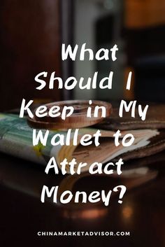 a stack of money sitting on top of a table with the words what should i keep in my wallet to attract money?