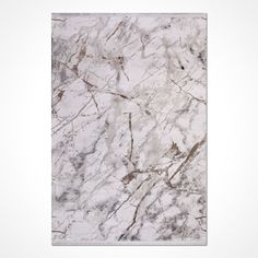 a white marble tile with grey veining