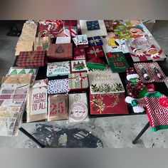 many different types of christmas cards on a table