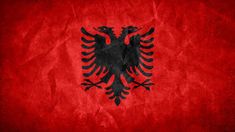 the flag of turkey is shown in black and red on an old paper textured background