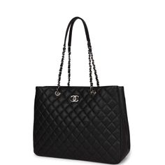 This Timeless tote bag is made of black caviar with silver tone hardware; featuring the CC signature turnlock, rear exterior slip pocket and interwoven silver tone chain link and black leather shoulder straps. The interior is lined in black fabric and has two open pockets on the front wall and a zipper pocket with a Chanel pull on the rear wall. Collection: 26-series (2018-2019)Origin: FranceCondition: New and never worn Accompanied by: Chanel box, Chanel dustbag, COA card, Carebook, retail UPCMeasurements: 14.2" width x 11" height 4.5" depth; 10" shoulder straps Chanel Tote Bag, Chanel Box, Chanel Tote, Front Wall, Shopping Chanel, Tote Bag Black, Black Caviar, Sierra Leone, Black Tote Bag