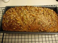 a loaf of bread sitting on top of a cooling rack