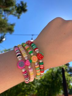 ~Handmade clay Beaded Bracelet 🍉 ~dragon fruit, red strawberry, orange, & pink stawberry bracelets with pearls ♡ ~The string is 6 1/2 inches although I can customize larger or smaller sizes.   (if you want a different size message me the size when ordering) 🍉 ~Stretchy string to fit perfectly around your wrist  ♡   ~Comfortable fit  🍉 ~Can be worn daily  ♡ ~⚠️Would not recommend wearing these in the water⚠️ Strawberry Clay Bracelet, Dragon Fruit Clay Bead Bracelet, Strawberry Clay Bead Bracelet, Fun Red Beaded Bracelet, Pink Fun Jewelry With Fruit Design, Fun Pink Jewelry With Fruit Design, Fun Pink Fruit Design Jewelry, Novelty Pink Beaded Bracelets With Colorful Beads, Pink Beaded Novelty Friendship Bracelets